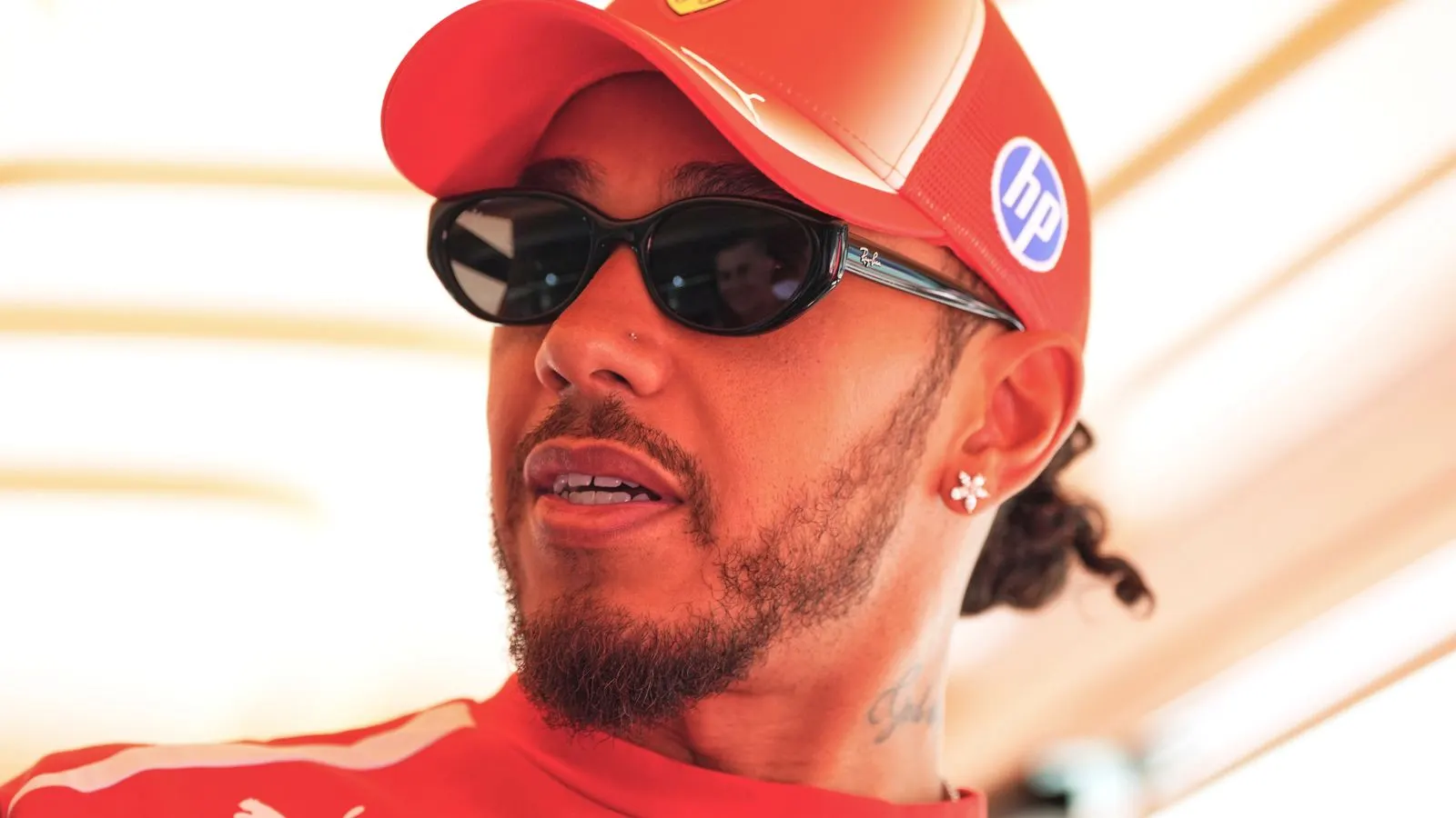 Hamilton Calls for Positivity as Ferrari's Title Hopes Slip Away