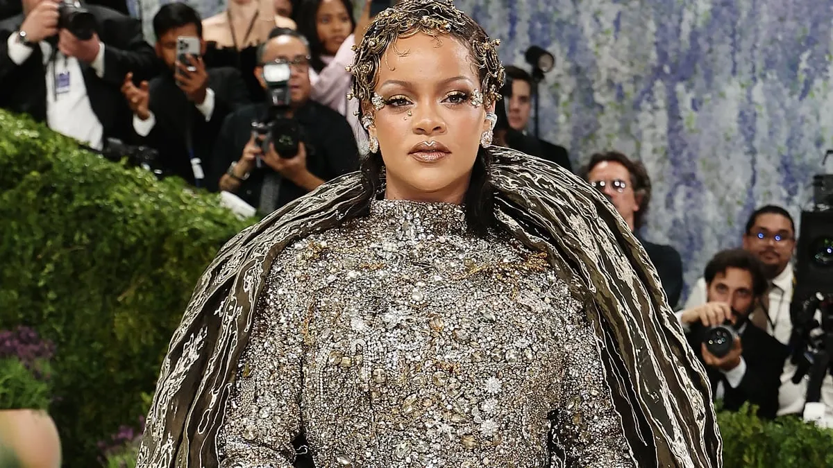 Rihanna Shines in Bold Gold Garb at Paris Fashion Week
