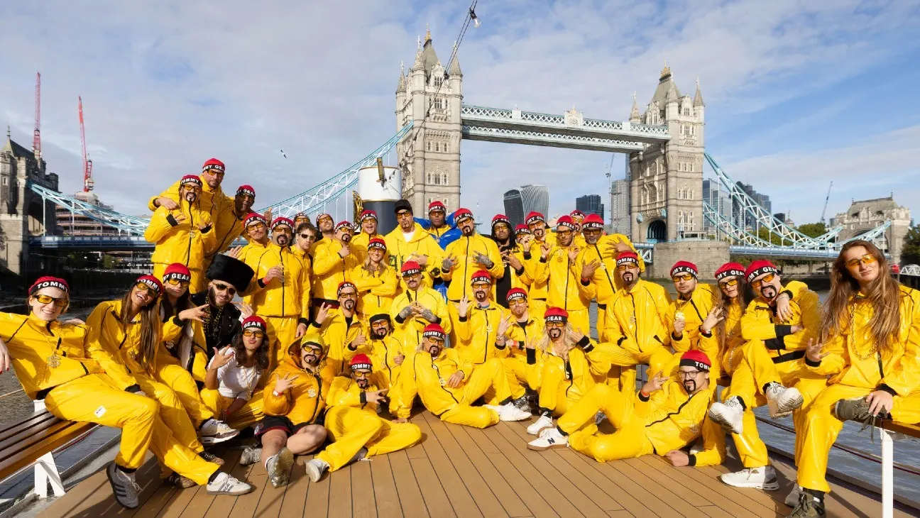 Sacha Baron Cohen Leads 300 Ali G Look-Alikes Through London Streets